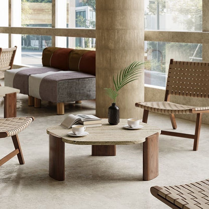 Top view showing the irregular asymmetrical shape of a travertine coffee table.