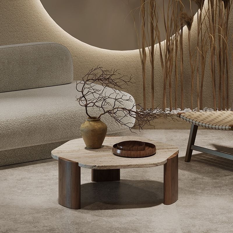 Modern living room with a wooden coffee table, vase, and decorative branches.